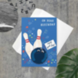 Bowling-themed birthday card with pins and a bowling ball alongside 'On Your Birthday' and 'Enjoy your day!' messages.