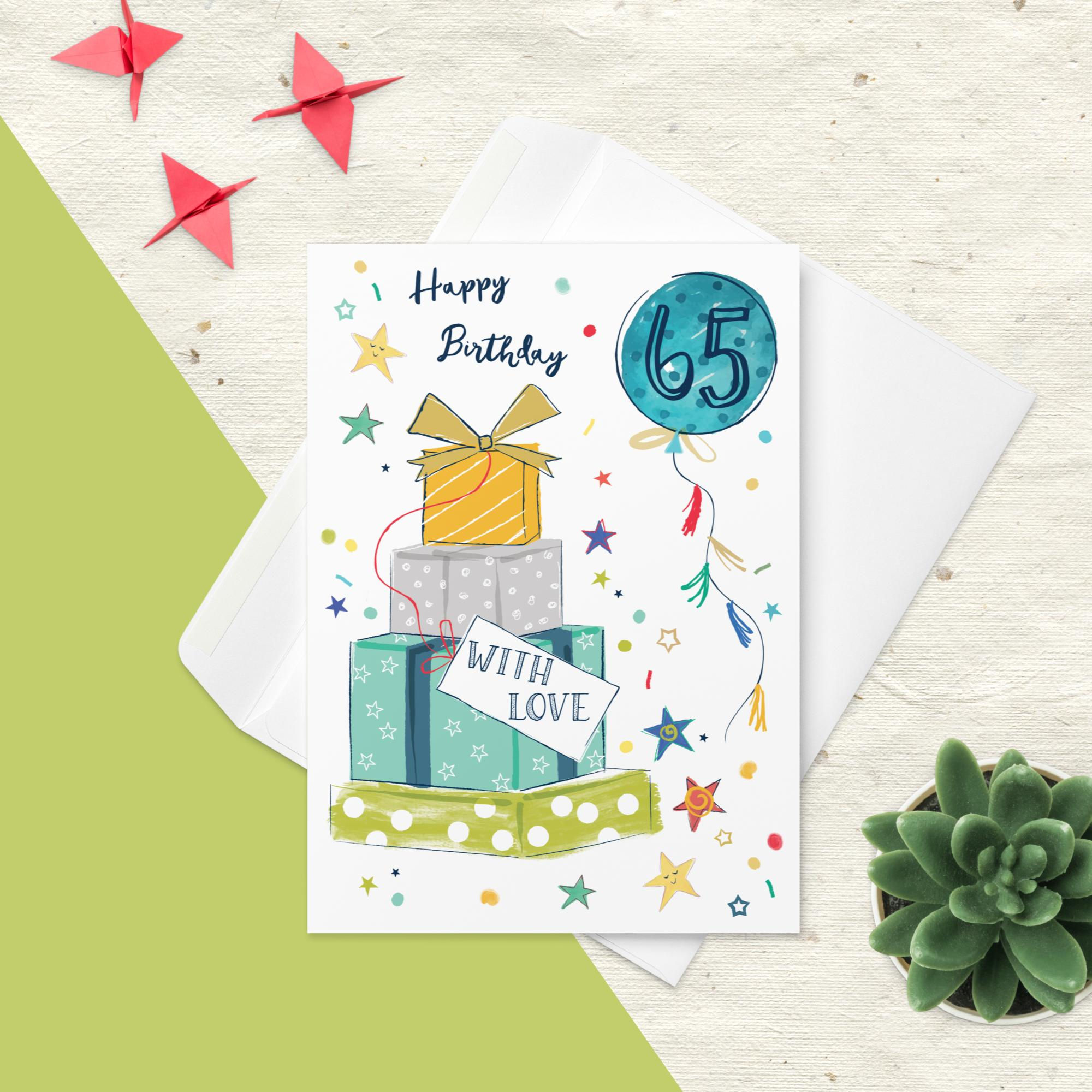"Happy Birthday 65" card with a vibrant blue balloon emblazoned with the number 65, a stack of gifts.