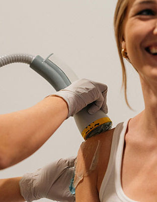 Patient receiving SoftWave TRT on shoulder