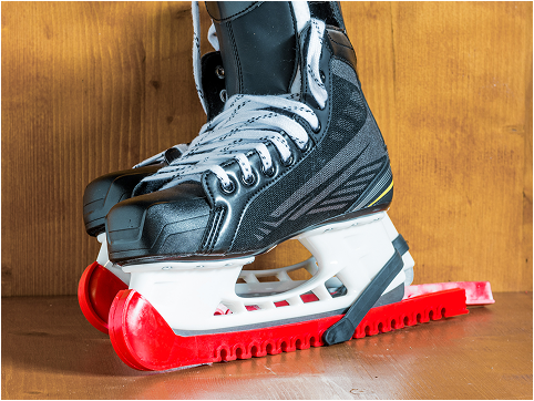 Ice skate with red blade guards
