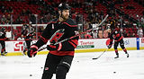 Hockey player #74 on ice