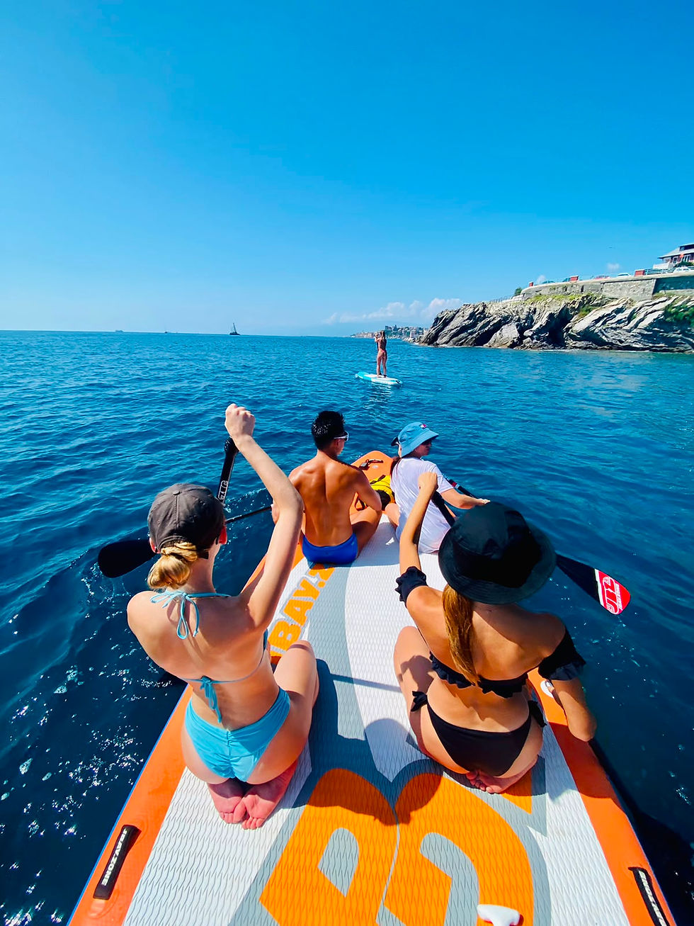 Group SUP outing near Priaruggia Genoa with Supzena