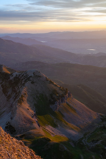 View of Wasatch Range during sunrise on the summit of Mount Timpanogos.