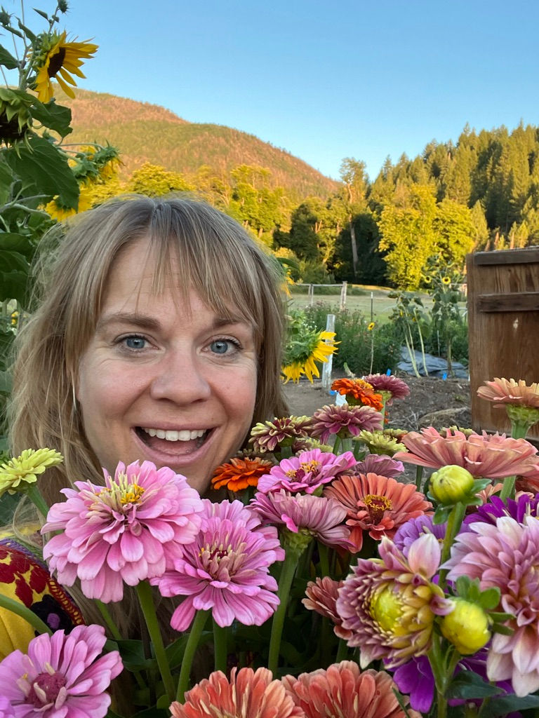 A bucket of zinnias, mountains, smile, flower farm