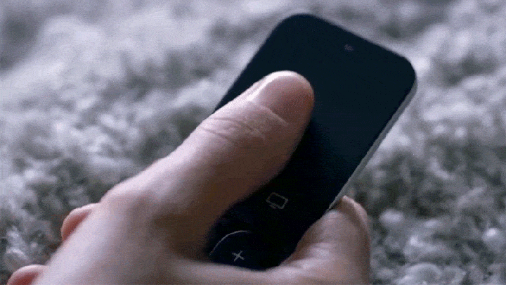 apple tv remote being pressed