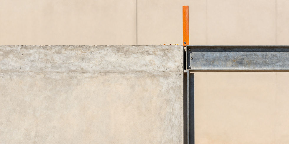 High-end editorial architectural photography of a minimalist workspace with raw plywood textures and north-facing natural light.