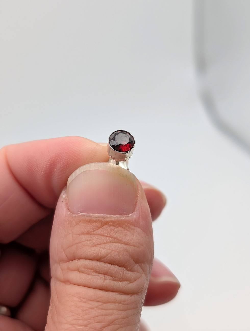Thumbnail: Sterling Silver Faceted Garnet Stud Earrings