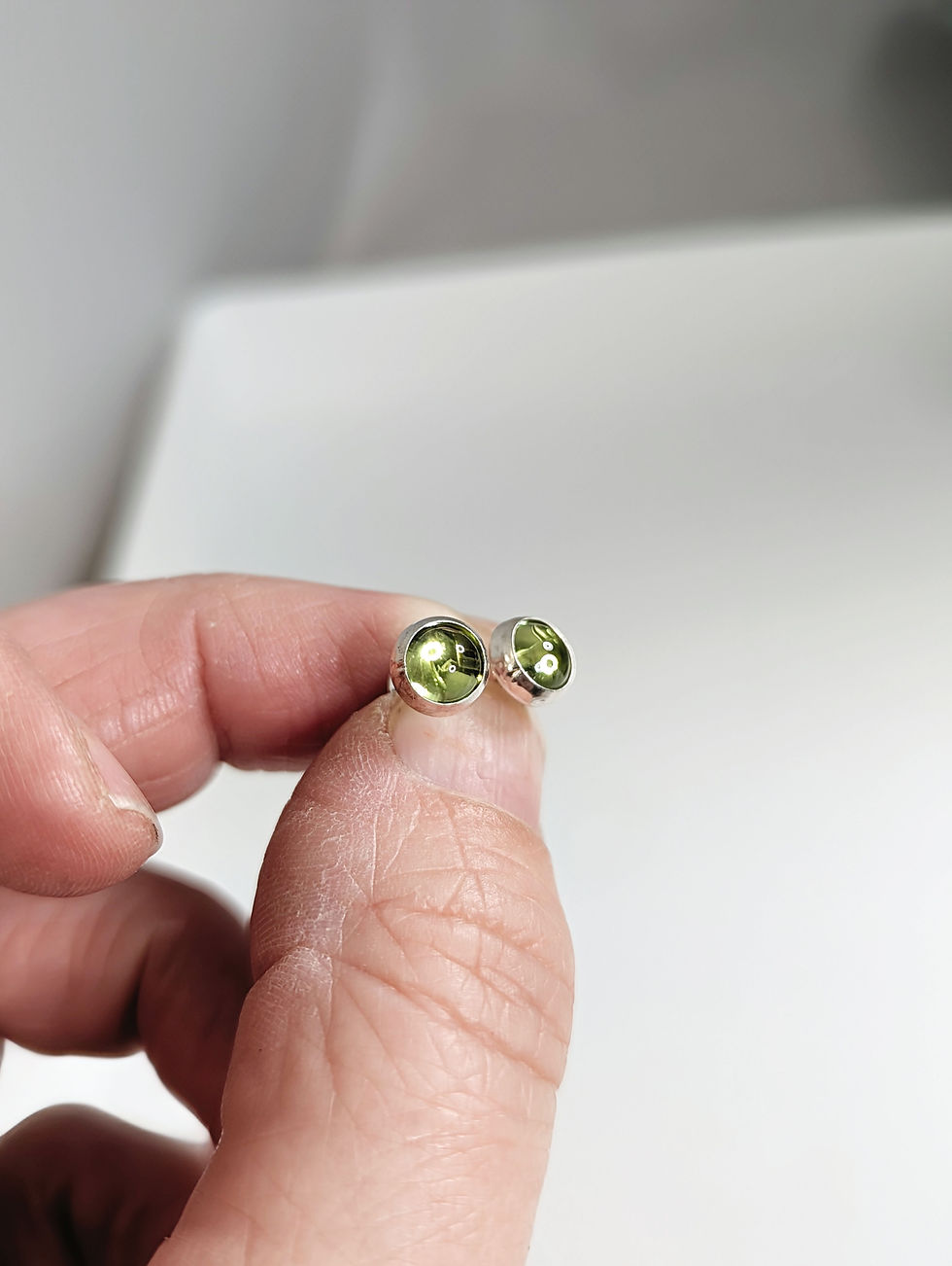 Thumbnail: Small Round Sterling Silver Stud Earrings with Peridot