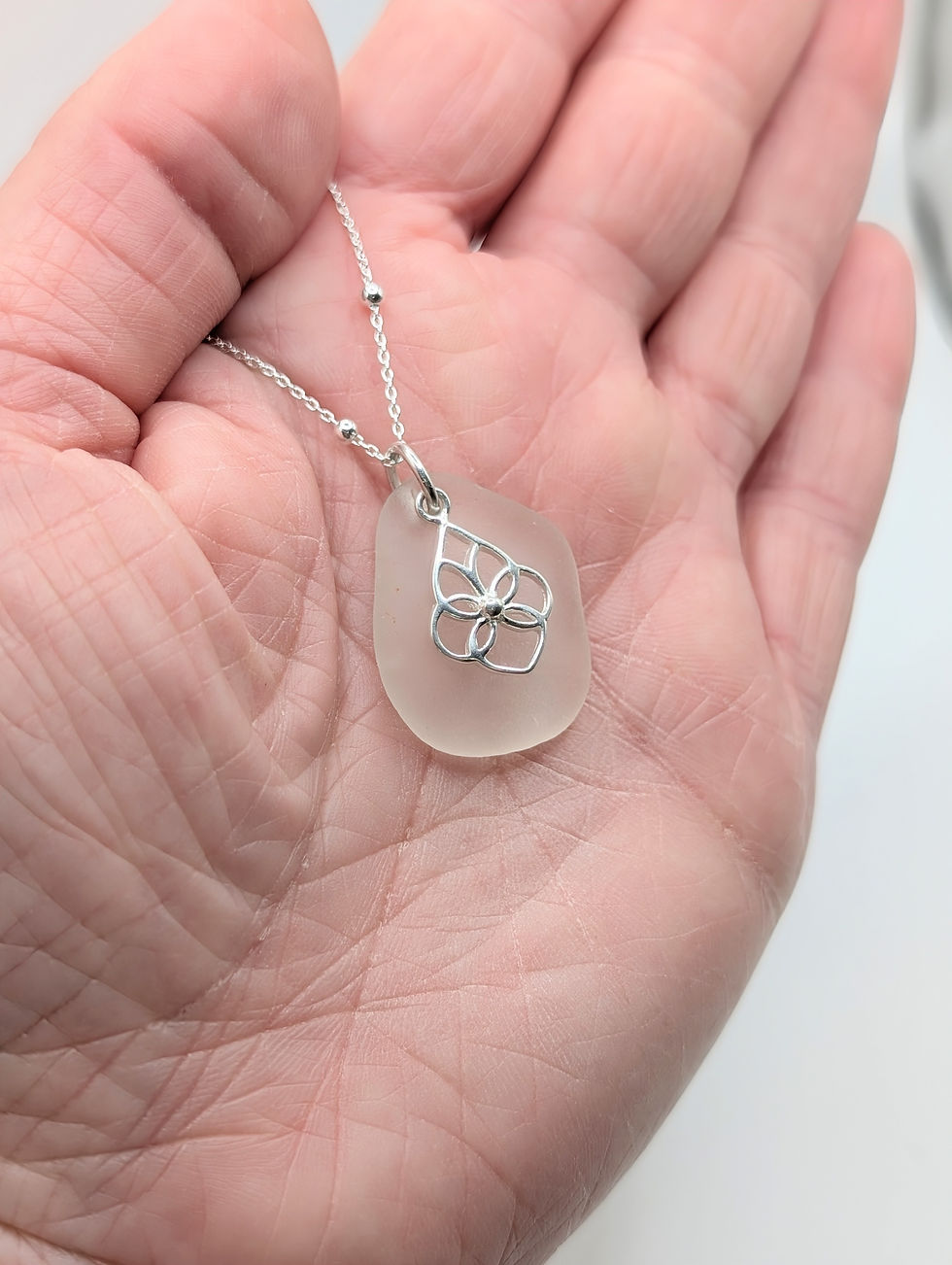 Thumbnail: White Suffolk Sea Glass Pendant with Sterling Silver Fancy Teardrop Overlay