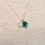 Thumbnail: Sterling Silver Flower Charm Necklace with Rare Teal Seaham Sea Glass