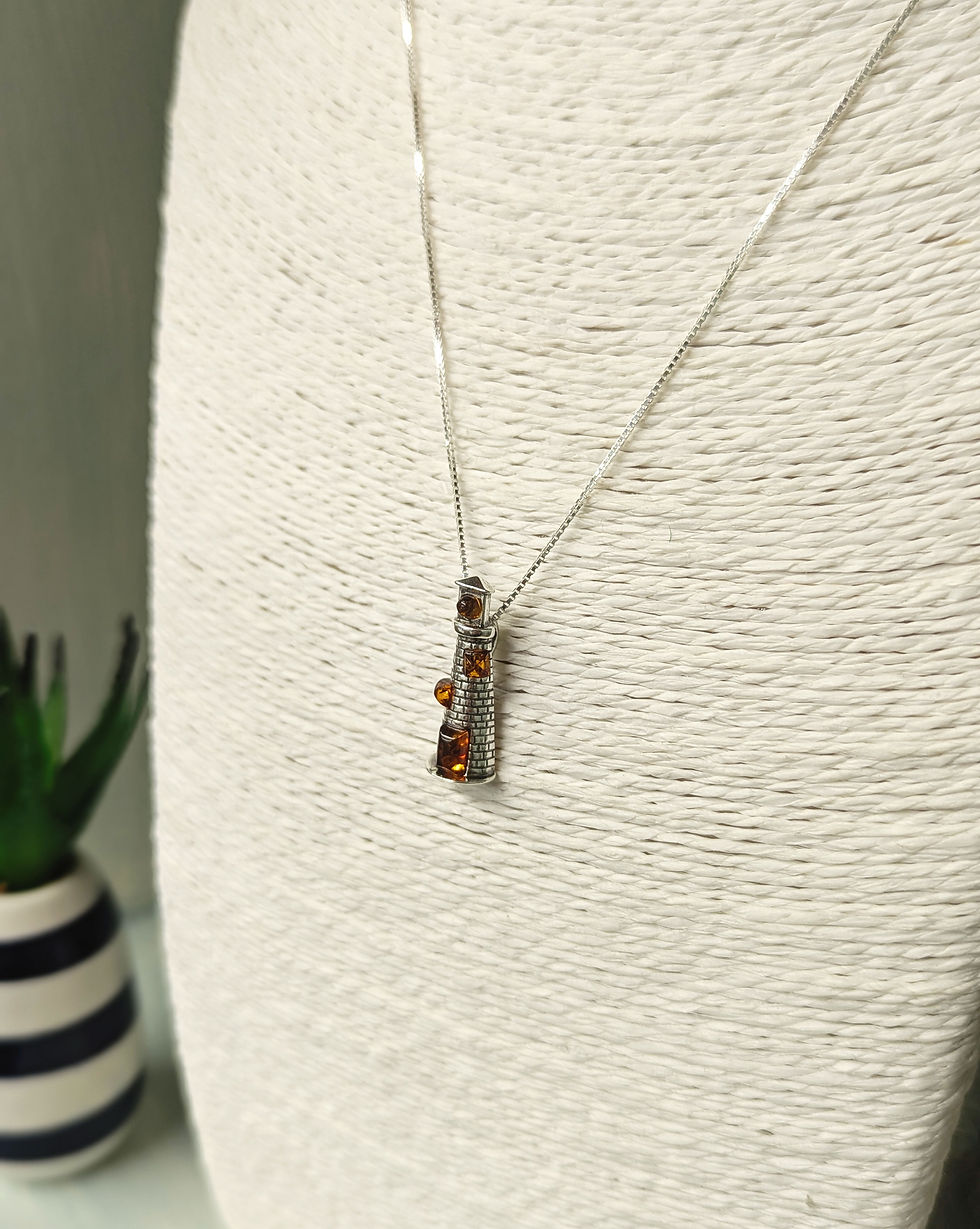 Thumbnail: Sterling Silver Lighthouse Pendant with Cognac Baltic Amber