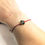 Thumbnail: Adjustable Red Cord Bracelet with Green Seaham Sea Glass