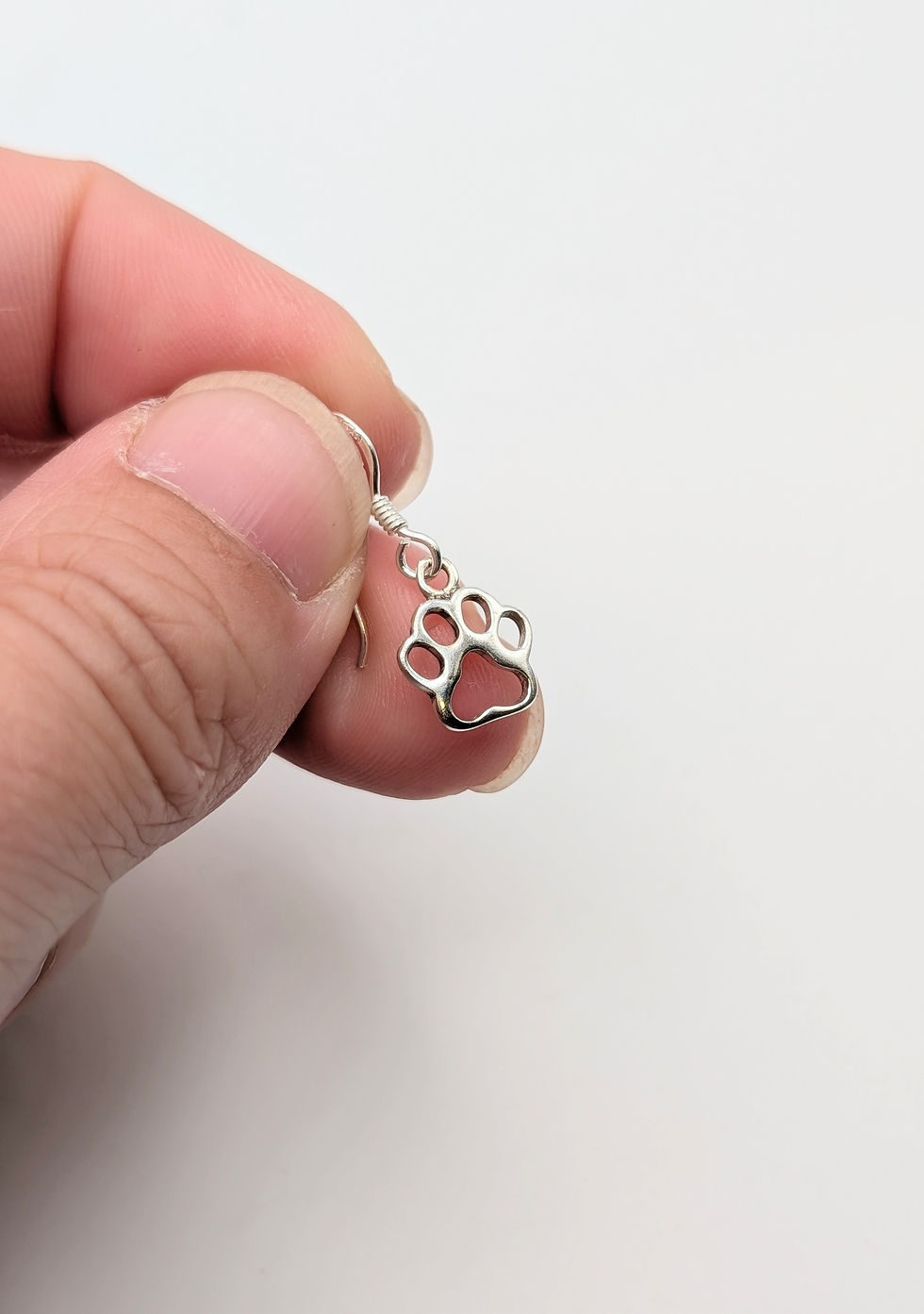 Thumbnail: Small Sterling Silver Paw Print Drop Earrings 