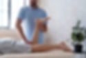 physiotherapist-helping-patient-close-up.jpg