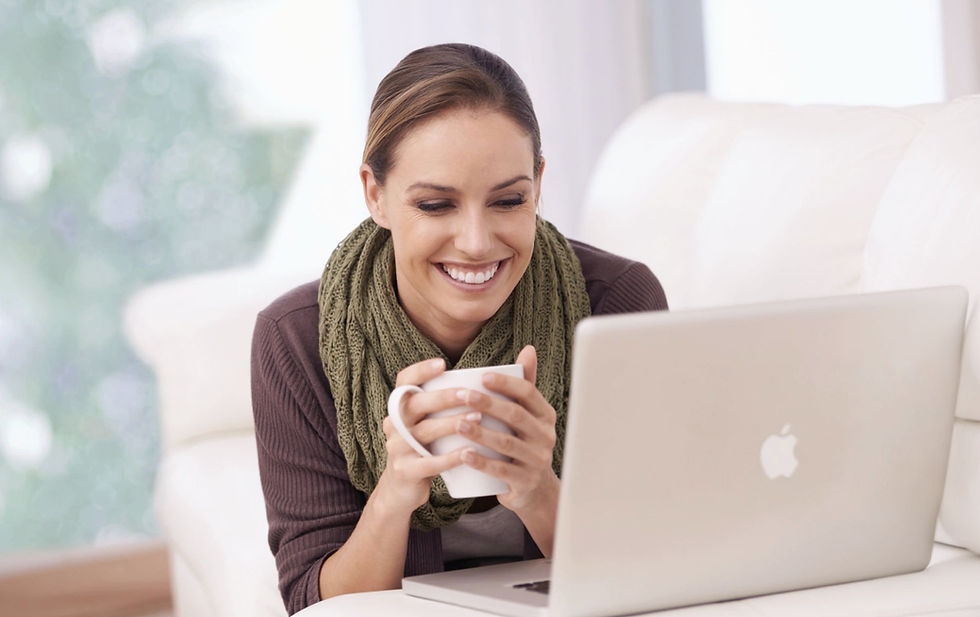 a woman smiling in the article The Real Reason You’re Burned Out (And It’s Not Just Your Job) by Asi Efros