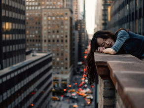 a woman experiencing a burn out in the article The Real Reason You’re Burned Out (And It’s Not Just Your Job) by Asi Efros