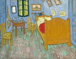 Van Gogh's The Bedroom, a bold painting featuring a single bed, two chairs, a table, and a window. This painting can be used to prompt descriptive writing.