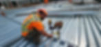MJ surveyor taking measurements of a roof