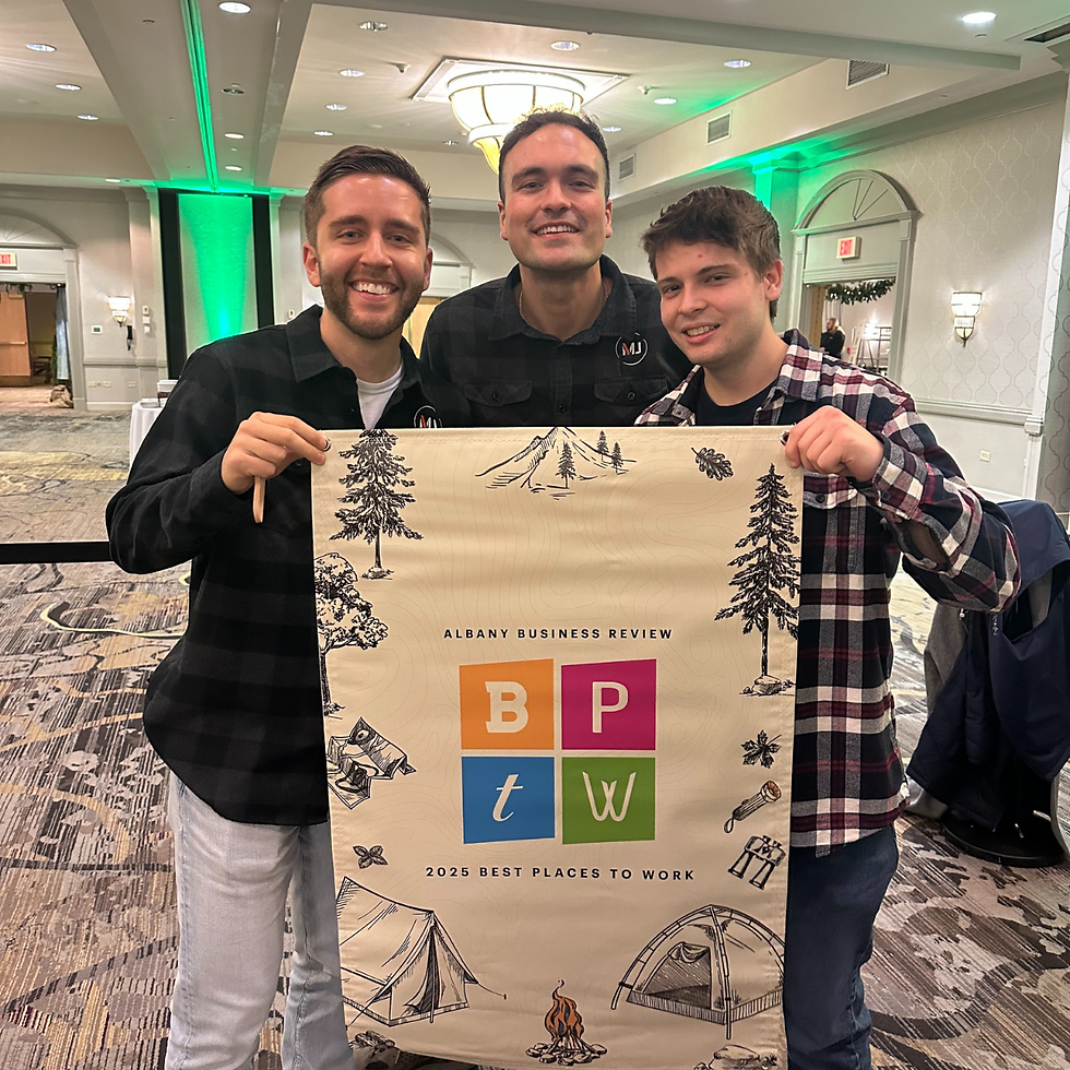 Kordell Costin, William Guida and Ben Dixon holding the BPTW poster.