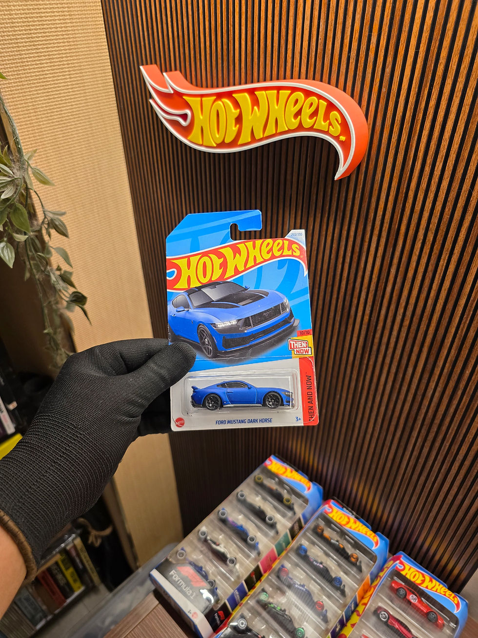 Hot Wheels Ford Mustang Dark Horse diecast model with premium collector detailing.