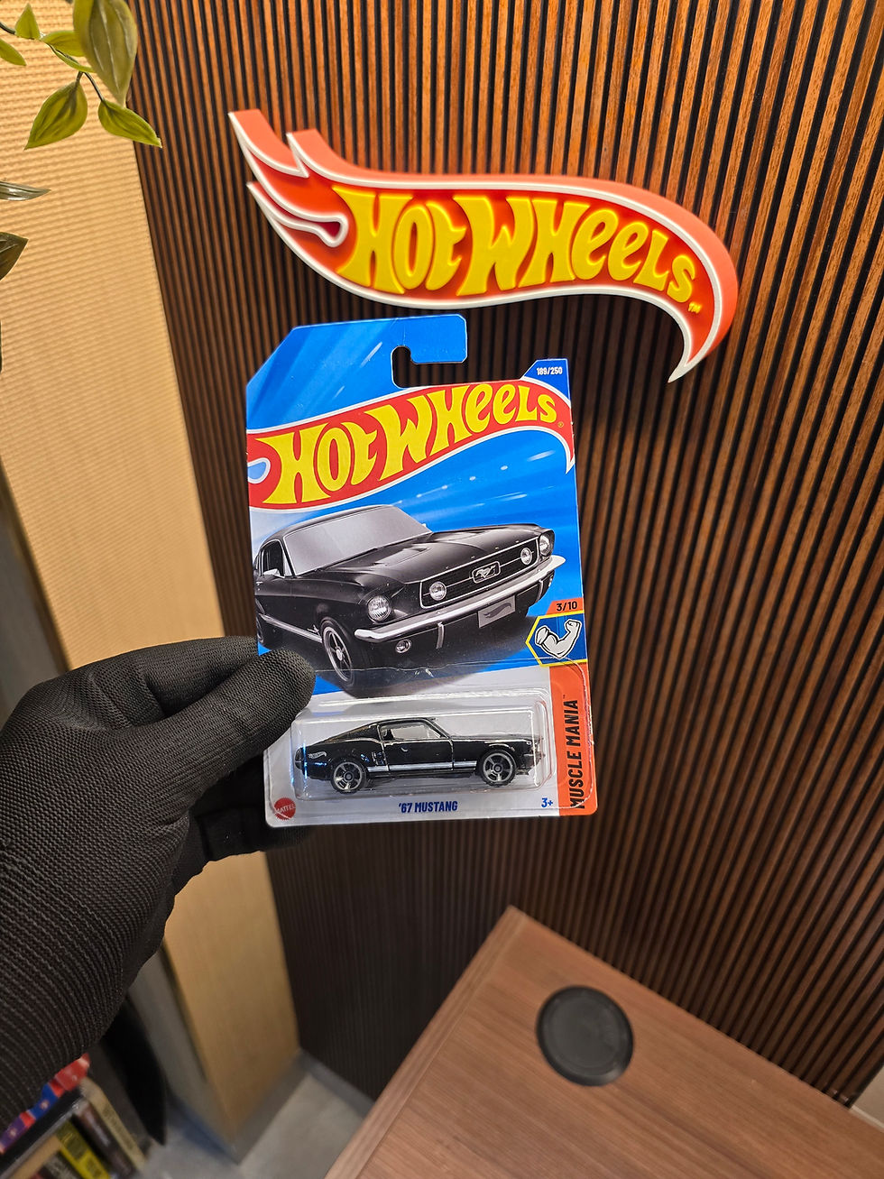 Hot Wheels '67 Mustang Black die-cast collectible in original blister packaging