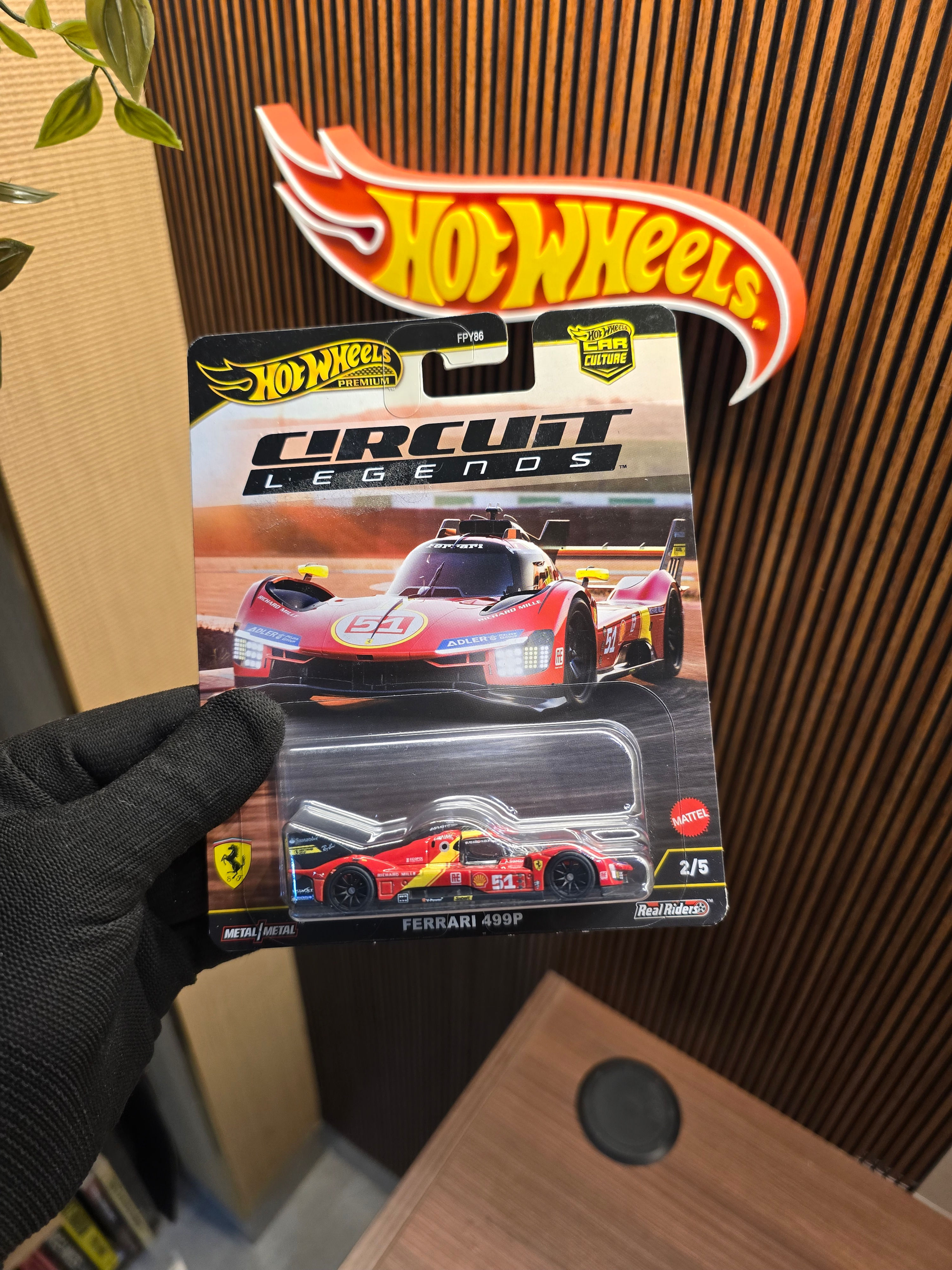 Hot Wheels Premium Ferrari 499P die-cast collectible in original premium blister packaging