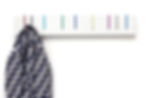 Thumbnail: Symbol Coat Rack in COLOR (white with rainbow hooks) mounted on white wall with black and white patterned coat hanging