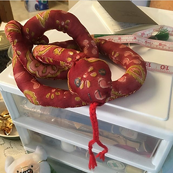 red stuffed snake