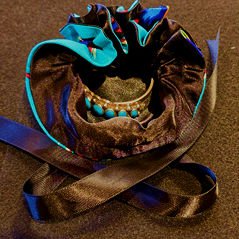 Turquoise cuff carefully tucked into jewelry pouch