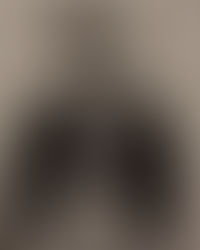 Traditional Squash Blossom Necklace worn by a young Native American girl