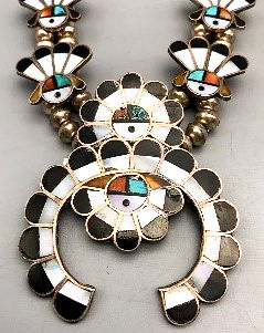 image of a Sunface themed necklace