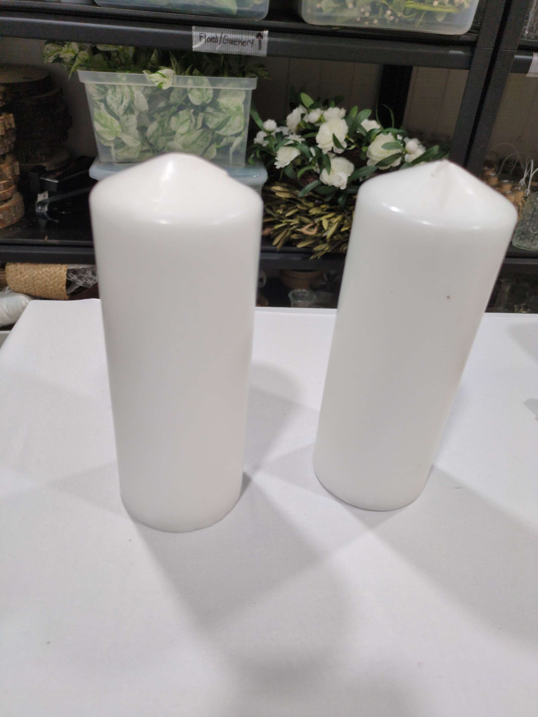 8" white pillar candles 