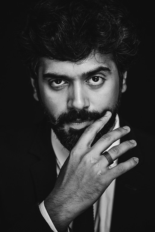 Ashwin Kakumanu twirling mustache