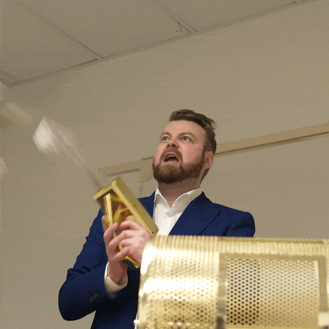freecompress-Graham Money Gun.gif