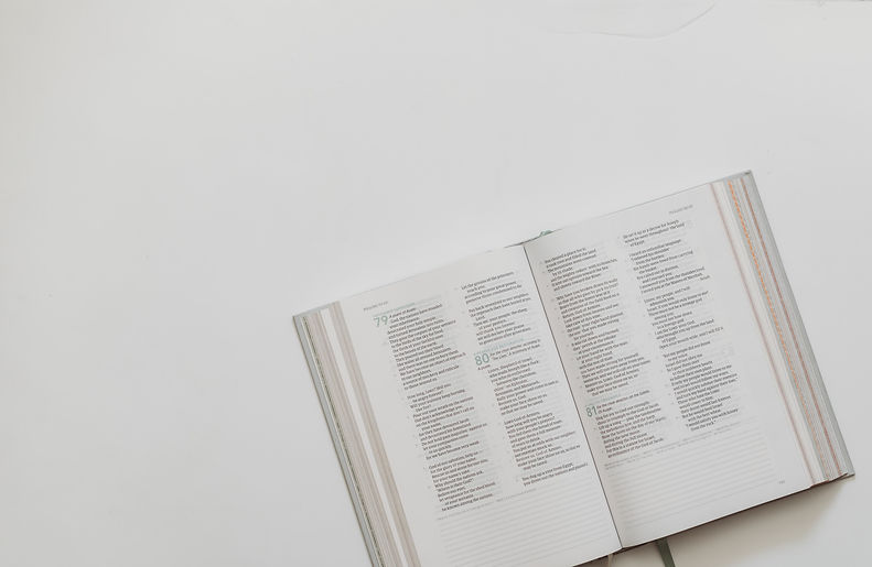 white book page on white table_edited.jpg