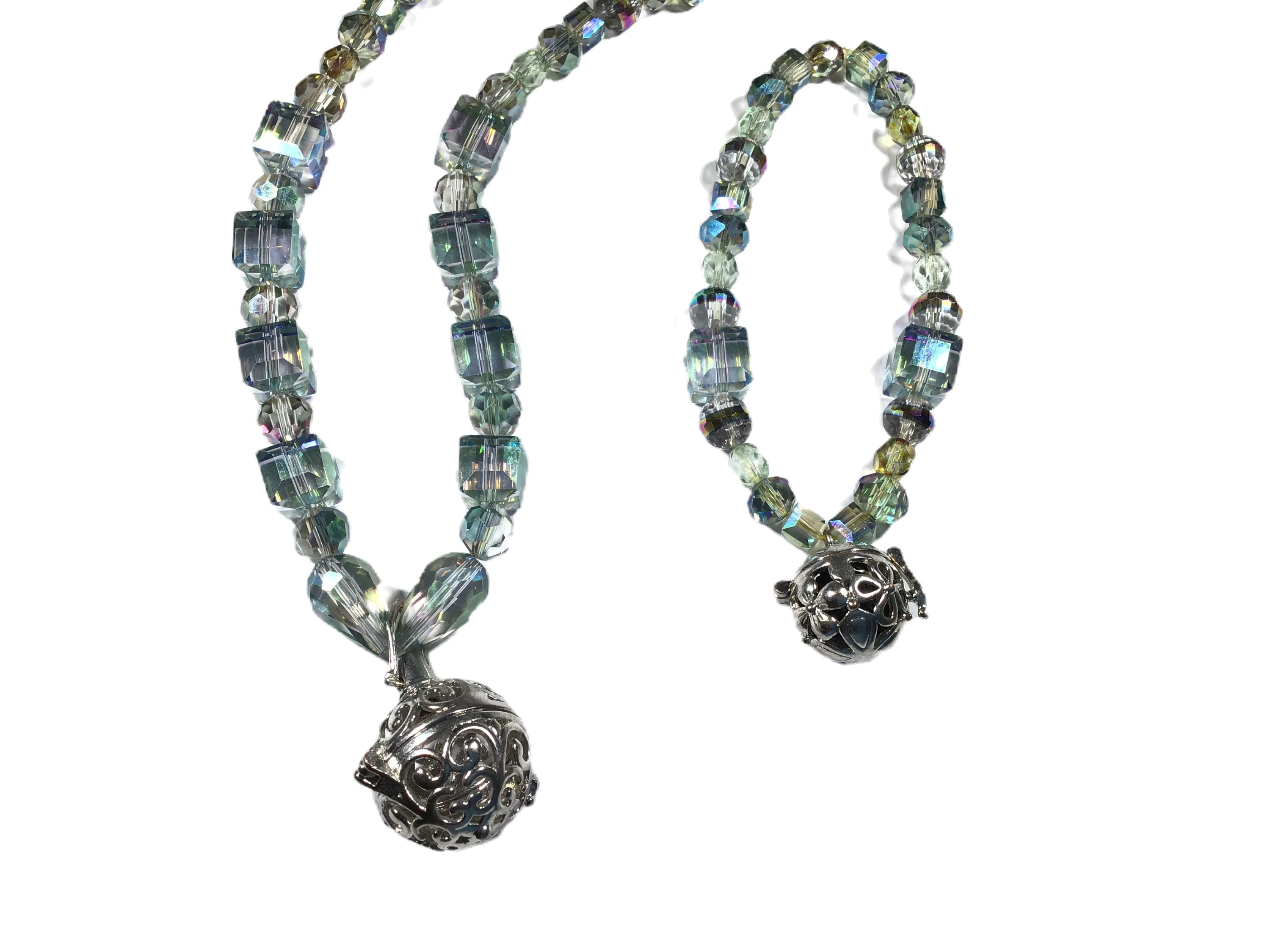 Green Crystal Necklace Set With Birdcage Lockets On Each Piece