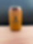 Orange tumbler engraved with the Rivet & Rae logo