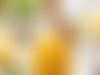 Homemade champagne vinaigrette dressing in a small glass bottle, light and smooth