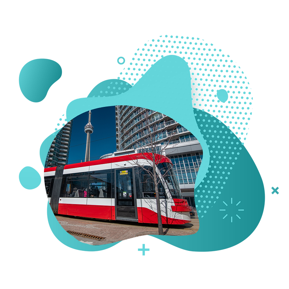 Toronto streetcar beside downtown buildings and the CN Tower