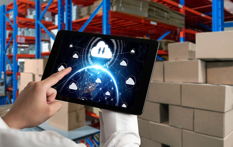 Person using cloud technology on tablet in door warehouse