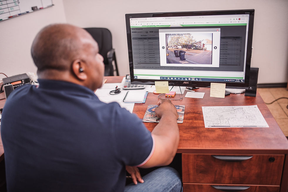 Man sitting at desktop using routing technology software