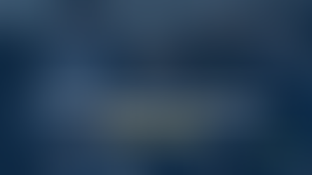 Text reads "Univerus Conference Postponed to February 2022" on background of professionals at table, with Univerus logo in corner.