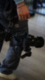 Videographer holding a camera