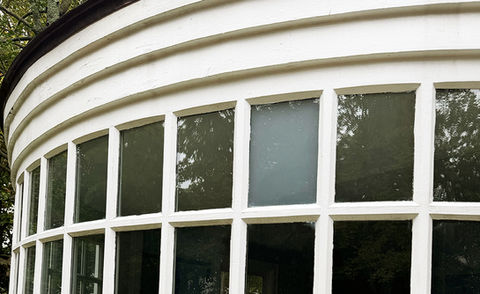 A window with multiple panes of glass. Foggy glass.