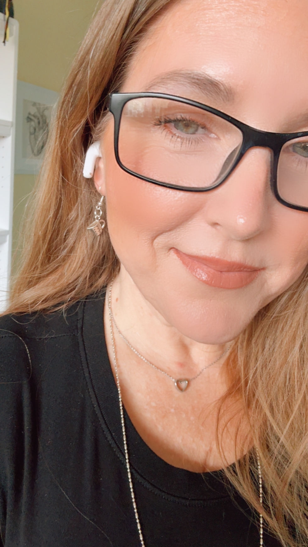Woman wearing silver coffee cup earrings math design minimalist nerd jewelry