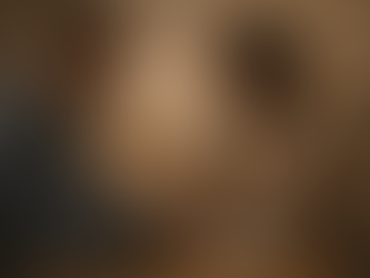 couple holding hands over kitchen table