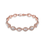 Thumbnail: Rose gold bracelet made up of marquise cut stones surrounded by tiny pave set stones