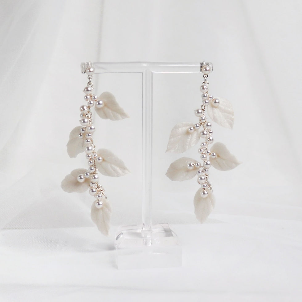 Dropper earrings with ivory clay leaves and ivory pearls