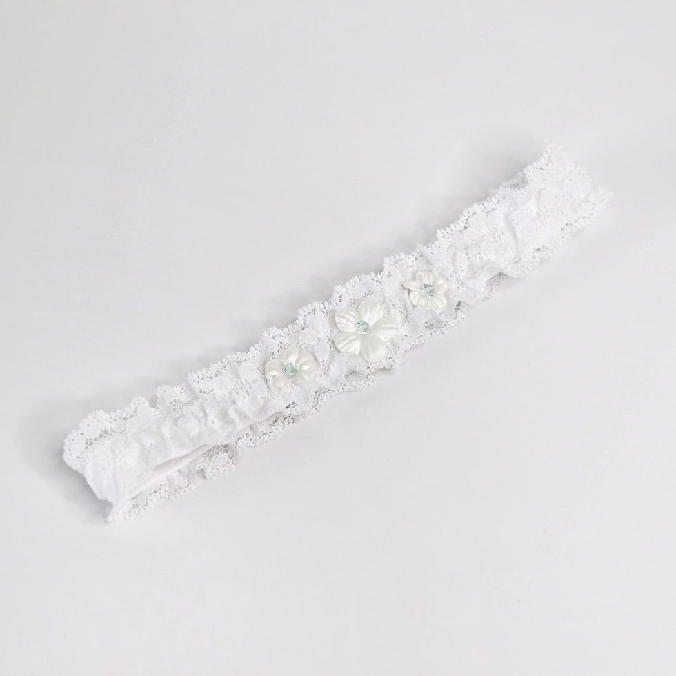Thumbnail: Lace bridal garter embellished with fabric flowers and blue crystal centres.