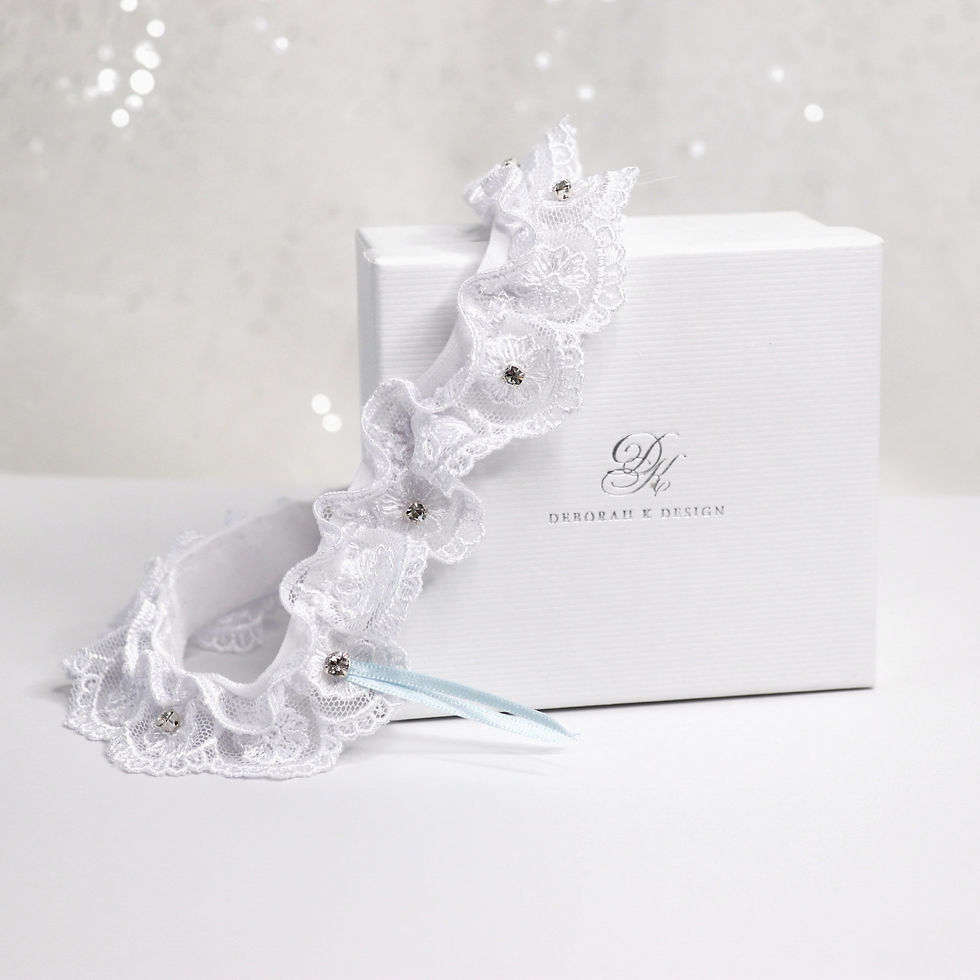 Thumbnail: Floral lace bridal garter embellished with diamante and blue ribbon bow